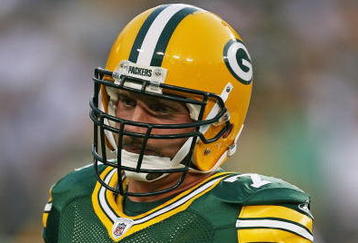 GREEN BAY, WI - SEPTEMBER 13: Aaron Kampman #74 of the Green Bay Packers participates in warm-ups before a game against the Chicago Bears on September 13, 2009 at Lambeau Field in Green Bay, Wisconsin. The Packers defeated the Bears 21-15.  (Photo by Jonathan Daniel/Getty Images)
