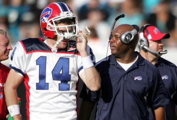 JACKSONVILLE, FL - NOVEMBER 22:  Head Coach Perry Fewell  and quarterback Ryan Fitzpatrick #14 of the Buffalo Bills watches his team  against the Jacksonville Jaguars at Jacksonville Municipal Stadium on November 22, 2009 in Jacksonville, Florida.  Jacksonville defeated Buffalo 18-15.  (Photo by Marc Serota/Getty Images)