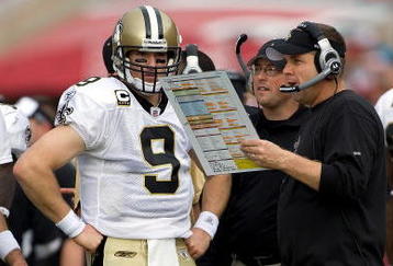 TAMPA, FL - NOVEMBER 22:  Quarterback Drew Brees #9 of the New Orleans Saints and head coach Sean Payton talk along the sidelines during the game against the Tampa Bay Buccaneers at Raymond James Stadium on November 22, 2009 in Tampa, Florida.  (Photo by J. Meric/Getty Images)