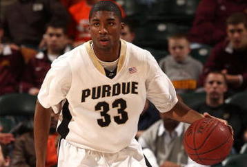 INDIANAPOLIS - MARCH 13:  E'Twaun Moore #33 of the Purdue Boilermakers brings the ball up court against the Penn State Nittany Lions during the second round of the Big Ten Men's Basketball Tournament at Conseco Fieldhouse on March 13, 2009 in Indianapolis, Indiana.  (Photo by Jonathan Daniel/Getty Images)
