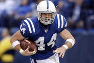 INDIANAPOLIS - NOVEMBER 8:  Dallas Clark #44 of the Indianapolis Colts runs with the ball during the NFL game against the Houston Texans at Lucas Oil Stadium on November 8, 2009 in Indianapolis, Indiana.  The Colts defeated the Texans 20-17.  (Photo by Andy Lyons/Getty Images)