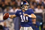 EAST RUTHERFORD, NJ - NOVEMBER 08:  Eli Manning #10 of the New York Giants looks to pass  against the San Diego Chargers on November 8, 2009 at Giants Stadium in East Rutherford, New Jersey.  (Photo by Chris McGrath/Getty Images)