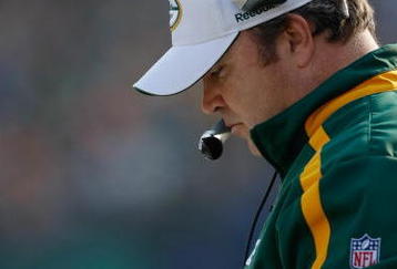 GREEN BAY, WI - NOVEMBER 22: Head coach Mike McCarthy of the Green Bay Packers looks at a play card as he stands on the sidelines against the San Francisco 49ers at Lambeau Field on November 22, 2009 in Green Bay, Wisconsin. The Packers defeated the 49ers 30-24. (Photo by Scott Boehm/Getty Images)