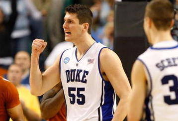 GREENSBORO, NC - MARCH 21:  Gary Johnson #1 of the Texas Longhorns reacts to a call as Brian Zoubek #55 of the Duke Blue Devils celebrates a foul during the second round of the NCAA Division I Men's Basketball Tournament at the Greensboro Coliseum on March 21, 2009 in Greensboro, North Carolina.  (Photo by Streeter Lecka/Getty Images)