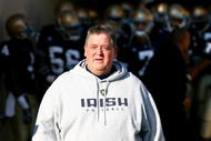 SOUTH BEND, IN - NOVEMBER 21: Head coach Charlie Weis of the Notre Dame Fighting Irish walks out of the tunnel before lining up to enter the field for a game against the Univeristy of Connecticut Huskies at Notre Dame Stadium on November 21, 2009 in South Bend, Indiana. (Photo by Jonathan Daniel/Getty Images)