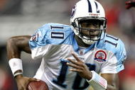HOUSTON - NOVEMBER 23:  Quarterback Vince Young #10 of the Tennessee Titans runs with the ball against the Houston Texans on November 23, 2009  at Reliant Stadium in Houston, Texas.  (Photo by Stephen Dunn/Getty Images)