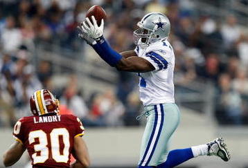 ARLINGTON, TX - NOVEMBER 22:  Wide receiver Roy Williams #11 of the Dallas Cowboys drops a pass in front of LaRon Landry #30 of the Washington Redskins at Cowboys Stadium on November 22, 2009 in Arlington, Texas.  (Photo by Ronald Martinez/Getty Images)
