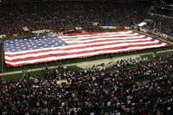 JACKSONVILLE, FL - DECEMBER 03:  A general view prior to kickoff during The National Anthem before the Virginia Tech Hokies take on the Florida State Seminoles in the inaugural ACC Championship Game at Alltel Stadium on December 3, 2005 in Jacksonville, Floida. Florida State defeated Virginia Tech 27-22.  (Photo by Doug Benc/Getty Images)