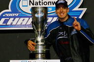 HOMESTEAD, FL - NOVEMBER 21: Kyle Busch, driver of the #18 Z-Line Designs Toyota, poses with the race trophy in Victory Lane after winning the NASCAR Nationwide Series Championship and the Ford 300 at Homestead-Miami Speedway on November 21, 2009 in Homestead, Florida. (Photo by Jason Smith/Getty Images for NASCAR)