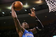 BOSTON - NOVEMBER 20: Dwight Howard #12 of the Orlando Magic dunks the ball and gets fouled by Rajon Rondo (not pictured) of the Boston Celtics during the game on November 20, 2009 at the TD Garden in Boston, Massachusetts. NOTE TO USER: User expressly acknowledges and agrees that, by downloading and or using this photograph, User is consenting to the terms and conditions of the Getty Images License Agreement.  (Photo by Elsa/Getty Images)