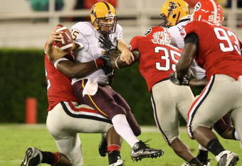 ATHENS, GA - SEPTEMBER 26: Danny Sullivan #15 of the Arizona State Sun Devils is sacked by Justin Houston #42 of the Georgia Bulldogs at Sanford Stadium on September 26, 2009 in Athens, Georgia. (Photo by Scott Cunningham/Getty Images)