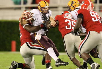 ATHENS, GA - SEPTEMBER 26: Danny Sullivan #15 of the Arizona State Sun Devils is sacked by Justin Houston #42 of the Georgia Bulldogs at Sanford Stadium on September 26, 2009 in Athens, Georgia. (Photo by Scott Cunningham/Getty Images)