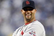 LOS ANGELES, CA - OCTOBER 07:  Albert Pujols #5 of the St. Louis Cardinals smiles during pregame introductions before taking on the Los Angeles Dodgers in Game One of the NLDS during the 2009 MLB Playoffs at Dodger Stadium on October 7, 2009 in Los Angeles, California.  (Photo by Jeff Gross/Getty Images)