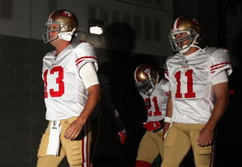 GLENDALE, AZ - SEPTEMBER 13:  Quarterbacks Shaun Hill #13 and Alex Smith #11 of the San Francisco 49ers walk out onto the field prior to the NFL game against the Arizona Cardinals at the Universtity of Phoenix Stadium on September 13, 2009 in Glendale, Arizona.  (Photo by Christian Petersen/Getty Images)