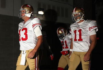 GLENDALE, AZ - SEPTEMBER 13:  Quarterbacks Shaun Hill #13 and Alex Smith #11 of the San Francisco 49ers walk out onto the field prior to the NFL game against the Arizona Cardinals at the Universtity of Phoenix Stadium on September 13, 2009 in Glendale, Arizona.  (Photo by Christian Petersen/Getty Images)