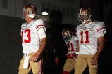 GLENDALE, AZ - SEPTEMBER 13:  Quarterbacks Shaun Hill #13 and Alex Smith #11 of the San Francisco 49ers walk out onto the field prior to the NFL game against the Arizona Cardinals at the Universtity of Phoenix Stadium on September 13, 2009 in Glendale, Arizona.  (Photo by Christian Petersen/Getty Images)