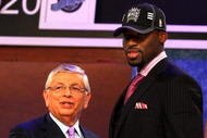 NEW YORK - JUNE 25:  NBA Commissioner David Stern poses for a photograph with the fourth overall draft pick by the Sacramento Kings,  Tyreke Evans during the 2009 NBA Draft at the Wamu Theatre at Madison Square Garden June 25, 2009 in New York City. NOTE TO USER: User expressly acknowledges and agrees that, by downloading and/or using this Photograph, User is consenting to the terms and conditions of the Getty Images License Agreement.  (Photo by Jim McIsaac/Getty Images)