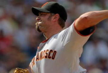 DENVER - AUGUST 23:  Relief picher Jeremy Affeldt #41 of the San Francisco Giants delivers against the Colorado Rockies at Coors Field on August 23, 2009 in Denver, Colorado. The Rockies defeated the Giants 4-2.  (Photo by Doug Pensinger/Getty Images)