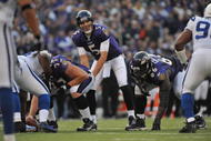 BALTIMORE - NOVEMBER 22:  Joe Flacco #5 of the Baltimore Ravens takes the snap during the game against the Indianapolis Colts at M&T Bank Stadium on November 22, 2009 in Baltimore, Maryland. The Colts defeated the Ravens 17-15. (Photo by Larry French/Getty Images)