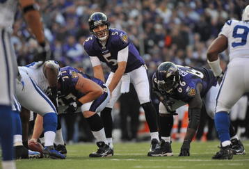 BALTIMORE - NOVEMBER 22:  Joe Flacco #5 of the Baltimore Ravens takes the snap during the game against the Indianapolis Colts at M&T Bank Stadium on November 22, 2009 in Baltimore, Maryland. The Colts defeated the Ravens 17-15. (Photo by Larry French/Getty Images)