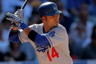 DENVER - AUGUST 27:  Juan Castro #14 of the Los Angeles Dodgers takes an at bat against the Colorado Rockies at Coors Field on August 27, 2009 in Denver, Colorado. The Dodgers defeated the Rockies 3-2.  (Photo by Doug Pensinger/Getty Images)