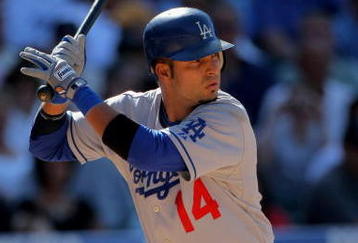 DENVER - AUGUST 27:  Juan Castro #14 of the Los Angeles Dodgers takes an at bat against the Colorado Rockies at Coors Field on August 27, 2009 in Denver, Colorado. The Dodgers defeated the Rockies 3-2.  (Photo by Doug Pensinger/Getty Images)