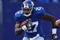 EAST RUTHERFORD, NJ - NOVEMBER 22:  Brandon Jacobs #27 of the New York Giants makes a break against the San Diego Chargers on November 8, 2009 at Giants Stadium in East Rutherford, New Jersey.  (Photo by Chris McGrath/Getty Images)