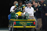GREEN BAY, WI - NOVEMBER 22: Defensive back Al Harris #31 of the Green Bay Packers is taken off the field on a cart after an injury against the San Francisco 49ers at Lambeau Field on November 22, 2009 in Green Bay, Wisconsin. The Packers defeated the 49ers 30-24. (Photo by Scott Boehm/Getty Images)