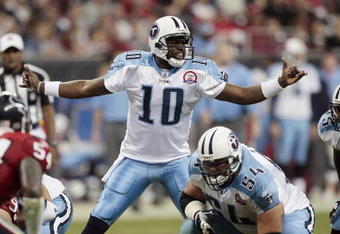 HOUSTON - NOVEMBER 23:  Quarterback Vince Young #10 of the Tennessee Titans changes the play at the line of scrimmage against the Houston Texans at Reliant Stadium on November 23, 2009 in Houston, Texas.  (Photo by Bob Levey/Getty Images)