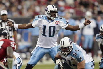 HOUSTON - NOVEMBER 23:  Quarterback Vince Young #10 of the Tennessee Titans changes the play at the line of scrimmage against the Houston Texans at Reliant Stadium on November 23, 2009 in Houston, Texas.  (Photo by Bob Levey/Getty Images)