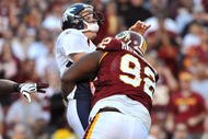 LANDOVER, MD - NOVEMBER 15:  Albert Haynesworth #92 of the Washington Redskins sacks Chris Simms #2 of the Denver Broncos at FedExField on November 15, 2009 in Landover, Maryland. The Redskins defeated the Broncos 27-17. (Photo by Larry French/Getty Images)
