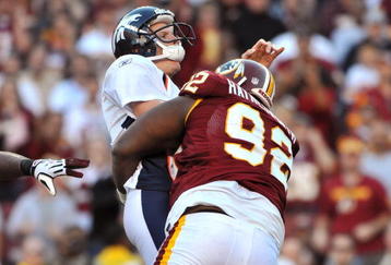 LANDOVER, MD - NOVEMBER 15:  Albert Haynesworth #92 of the Washington Redskins sacks Chris Simms #2 of the Denver Broncos at FedExField on November 15, 2009 in Landover, Maryland. The Redskins defeated the Broncos 27-17. (Photo by Larry French/Getty Images)