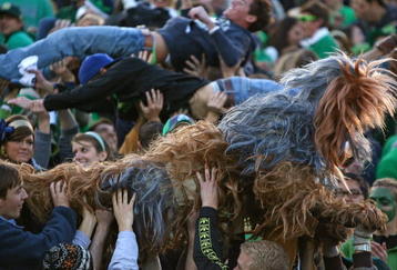SOUTH BEND, IN - OCTOBER 17: Student fans of the Notre Dame Fighting Irish, including one in a Star Wars 'Wookie' costume, celebrate a touchdown against the USC Trojans at Notre Dame Stadium on October 17, 2009 in South Bend, Indiana. USC defeated Notre Dame 34-27. (Photo by Jonathan Daniel/Getty Images)