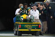 GREEN BAY, WI - NOVEMBER 22: Defensive back Al Harris #31 of the Green Bay Packers is taken off the field on a cart after an injury against the San Francisco 49ers at Lambeau Field on November 22, 2009 in Green Bay, Wisconsin. The Packers defeated the 49ers 30-24. (Photo by Scott Boehm/Getty Images)