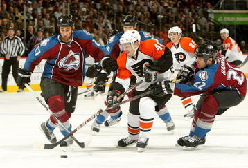 DENVER - NOVEMBER 23:  Danny Briere #48 of the Philadelphia Flyers controls the puck as Kyle Quincey #27 and Scott Hannan #22 of the Colorado Avalanche defend during NHL action at the Pepsi Center on November 23, 2009 in Denver, Colorado.  (Photo by Doug Pensinger/Getty Images)