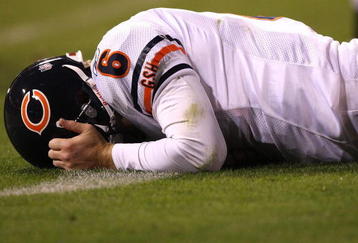 SAN FRANCISCO - NOVEMBER 12: Jay Cutler #6 of the Chicago Bears lies on the grass against the San Francisco 49ers at Candlestick Park on November 12, 2009 in San Francisco, California. The 49ers won 10-6. (Photo by Jed Jacobsohn/Getty Images)