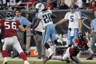 HOUSTON - NOVEMBER 23:  Running back Chris Johnson #28 of the Tennessee Titans rushes past linebacker Zac Diles #54 of the Houston Texans and Brian Cushing #56 in the second quarter at Reliant Stadium on November 23, 2009 in Houston, Texas.  (Photo by Bob Levey/Getty Images)
