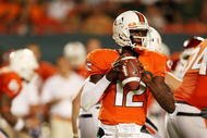 MIAMI GARDENS, FL - OCTOBER 03: Quarterback Jacory Harris #12 of the Miami Hurricanes drops back to pass against the Oklahoma Sooners at Land Shark Stadium on October 3, 2009 in Miami Gardens, Florida. Miami defeated Oklahoma 21-20. (Photo by Doug Benc/Getty Images)