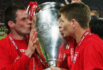 ISTANBUL, TURKEY - MAY 25:  Jamie Carragher and Steven Gerrard of Liverpool kiss the trophy following victory in the European Champions League final between Liverpool and AC Milan on May 25, 2005 at the Ataturk Olympic Stadium in Istanbul, Turkey.   (Photo by Alex Livesey/Getty Images)