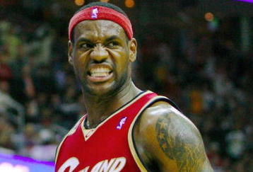 CLEVELAND - OCTOBER 27:  LeBron James #23 of the Cleveland Cavaliers reacts during the season opener against the Boston Celtics at Quicken Loans Arena on October 27, 2009 in Cleveland, Ohio.  NOTE TO USER: User expressly acknowledges and agrees that, by downloading and or using this photograph, User is consenting to the terms and conditions of the Getty Images License Agreement. (Photo by Gregory Shamus/Getty Images)
