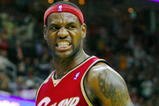 CLEVELAND - OCTOBER 27:  LeBron James #23 of the Cleveland Cavaliers reacts during the season opener against the Boston Celtics at Quicken Loans Arena on October 27, 2009 in Cleveland, Ohio.  NOTE TO USER: User expressly acknowledges and agrees that, by downloading and or using this photograph, User is consenting to the terms and conditions of the Getty Images License Agreement. (Photo by Gregory Shamus/Getty Images)