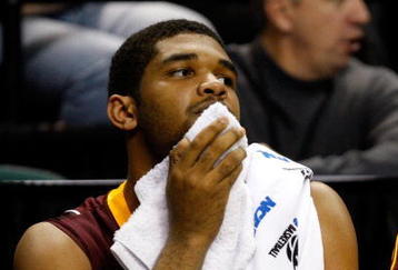 GREENSBORO, NC - MARCH 19:  Ralph Sampson III #50 of the Minnesota Golden Gophers wipes sweat from his face in the final minute of their 76-62 loss to the Texas Longhorns during the first round of the NCAA Division I Men's Basketball Tournament at the Greensboro Coliseum on March 19, 2009 in Greensboro, North Carolina.  (Photo by Streeter Lecka/Getty Images)