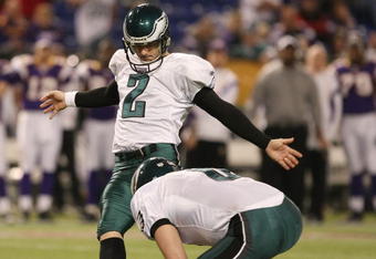 MINNEAPOLIS - JANUARY 04:  David Akers #2 of the Philadelphia Eagles kicks a field goal late in the fourth quarter as Sav Rocca #6 holds during the NFC Wild Card playoff game against the Minnesota Vikings on January 4, 2009 at the Hubert H. Humphrey Metrodome in Minneapolis, Minnesota. The Eagles defeated the Vikings 26-14.(Photo by Elsa/Getty Images)