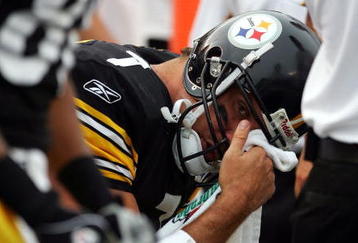 PITTSBURGH, PA - SEPTEMBER 25:  Ben Roethlisberger #7 of the Pittsburgh Steelers rests on the bench after an injury against the New England Patriots during the second quarter at Heinz Field on September 25, 2005 in Pittsburgh, Pennsylvania.  The Patriots won 23-20.  (Photo by Harry How/Getty Images)