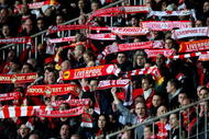 BUDAPEST, HUNGARY - NOVEMBER 24:  Liverpool fans support their team during the UEFA Champions League group E match between Debrecen and Liverpool at the Ferenc Puskas Stadium on November 24, 2009 in Budapest, Hungary.  (Photo by Richard Heathcote/Getty Images)