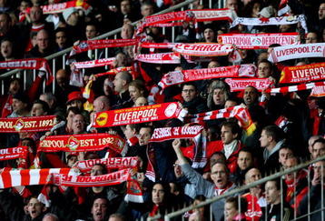 BUDAPEST, HUNGARY - NOVEMBER 24:  Liverpool fans support their team during the UEFA Champions League group E match between Debrecen and Liverpool at the Ferenc Puskas Stadium on November 24, 2009 in Budapest, Hungary.  (Photo by Richard Heathcote/Getty Images)