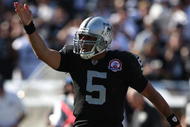 OAKLAND, CA - OCTOBER 25: Bruce Gradkowski #5 of the Oakland Raiders celebrates after getting a first down against the New York Jets during an NFL game at the Oakland-Alameda County Coliseum on October 25, 2009 in Oakland, California. (Photo by Jed Jacobsohn/Getty Images)
