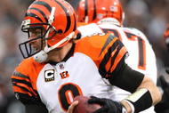 OAKLAND, CA - NOVEMBER 22:  Carson Palmer #9 of the Cincinnati Bengals runs with the ball against the Oakland Raiders during an NFL game at Oakland-Alameda County Coliseum on November 22, 2009 in Oakland, California. (Photo by Jed Jacobsohn/Getty Images)