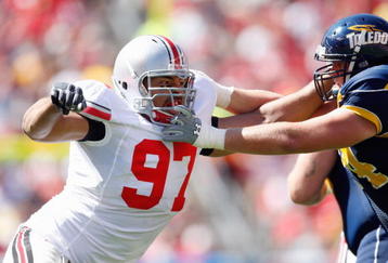 CLEVELAND - SEPTEMBER 19:  Cameron Heyward #97 of the Ohio State Buckeyes moves off the line during the game against the Toledo Rockets at Cleveland Browns Stadium on September 19, 2009 in Cleveland, Ohio. The Ohio State Buckeyes shutout the Toledo Rockets 38-0. (Photo by Gregory Shamus/Getty Images)
