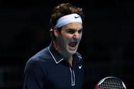 LONDON, ENGLAND - NOVEMBER 24:  Roger Federer of Switzerland celebrates winning the match during the men's singles second round match against Andy Murray of Great Britain during the Barclays ATP World Tour Finals at the O2 Arena on November 24, 2009 in London, England.  (Photo by Clive Brunskill/Getty Images)